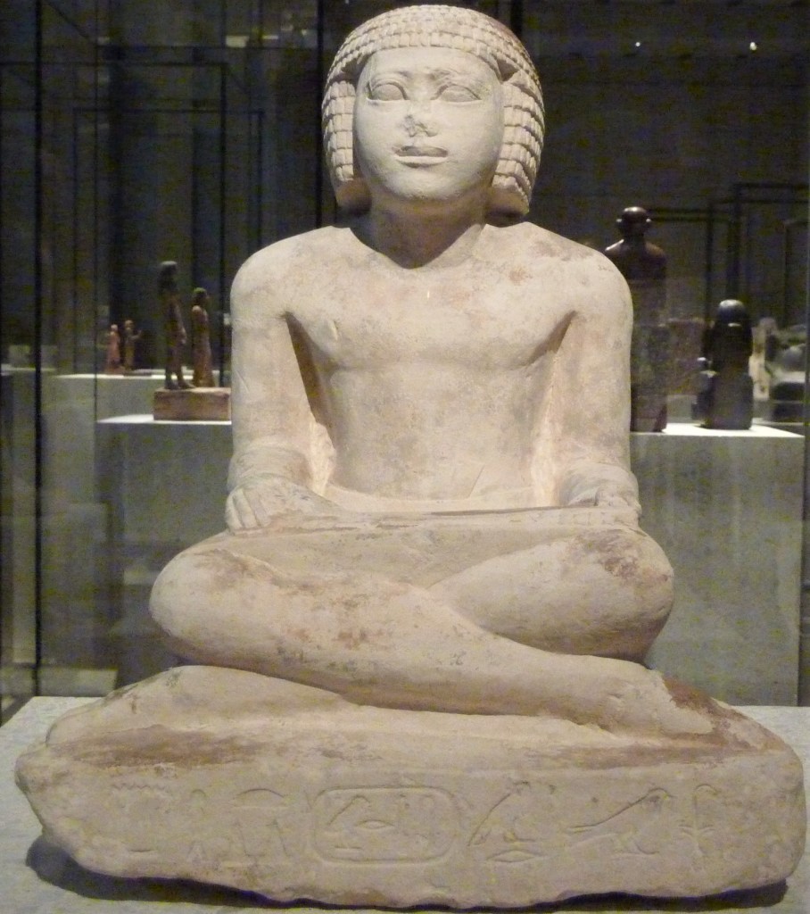 Old Kingdom statue of a seated scribe.