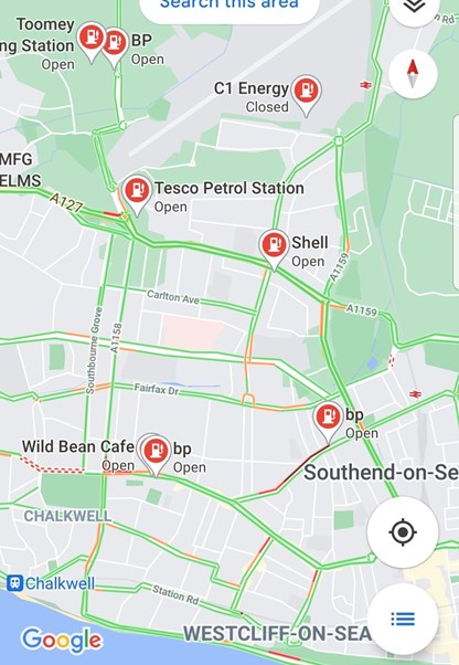 Google maps image showing a detail of the Southend-on-sea area, with petrol stations marked and traffic information turned on. Some petrol stations show a red queue of traffic approaching their entrances, while others do not. 