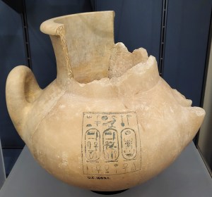 Picture of a large white calcite (alabaster) jar with incised hieroglyphs.