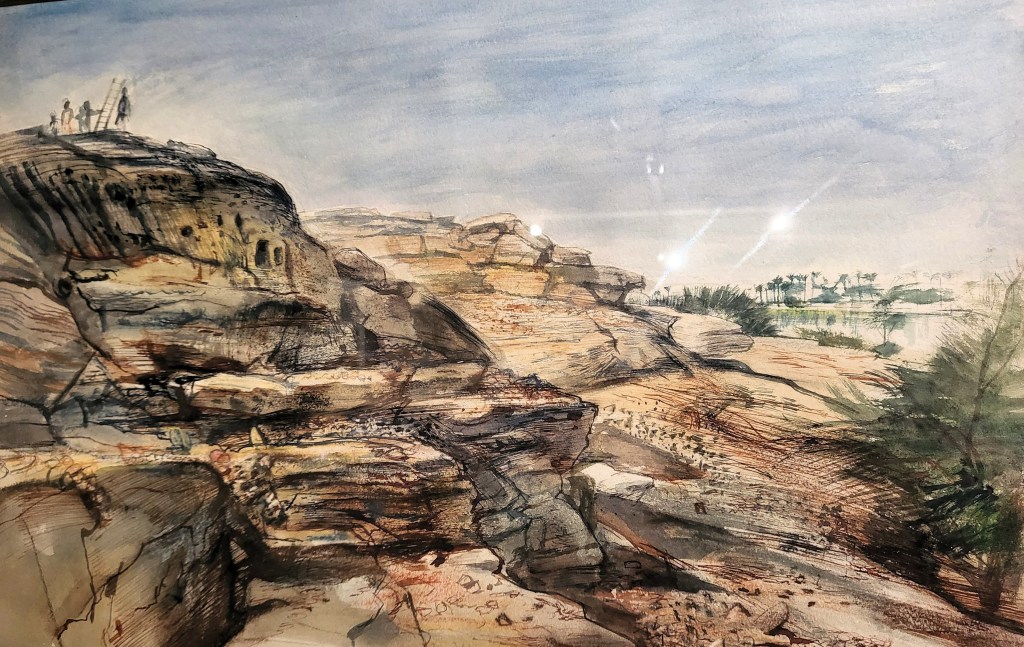 Landscape painting of desert cliffs leading down to vegetation and a wide river on the right of the image. In the centre left are small square rectangles, indicating entrances in the cliff. On top of the cliff a party of four people brings a ladder to access the site.